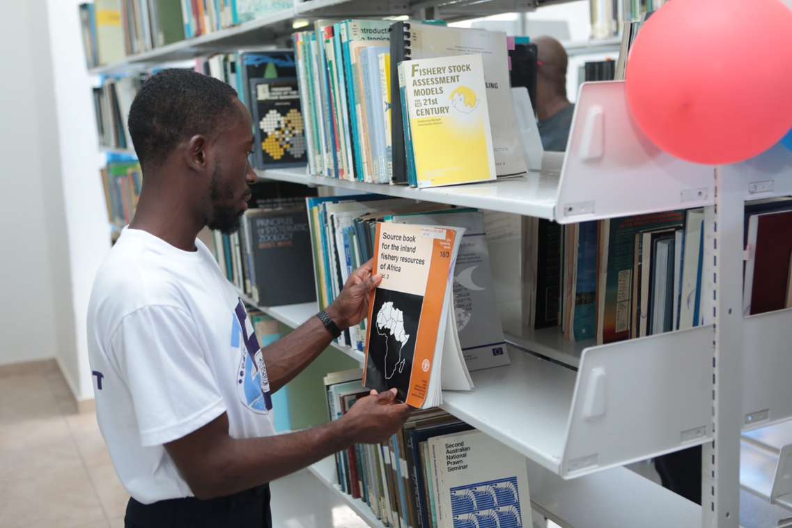 A Student Using the Daniel Pauly and Rashid Sumaila Library 